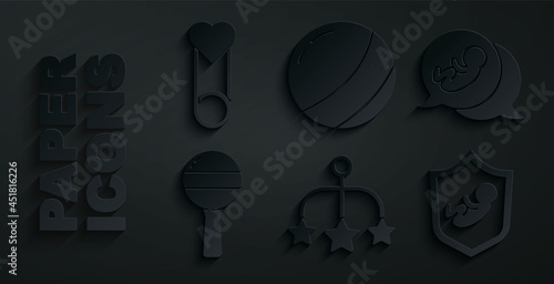 Set Baby crib hanging toys, Rattle baby, on shield, Beach ball and clothes pin icon. Vector