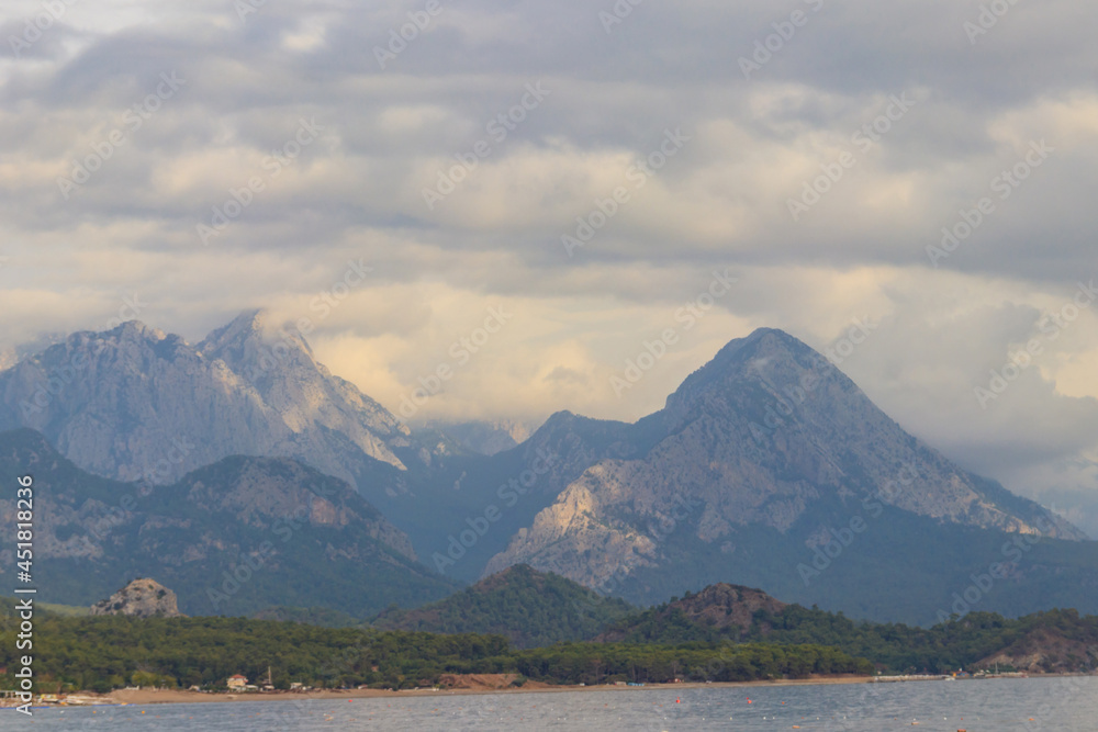 View of the Mediterranean sea coast and the Taurus mountains in Kemer, Antalya province in Turkey