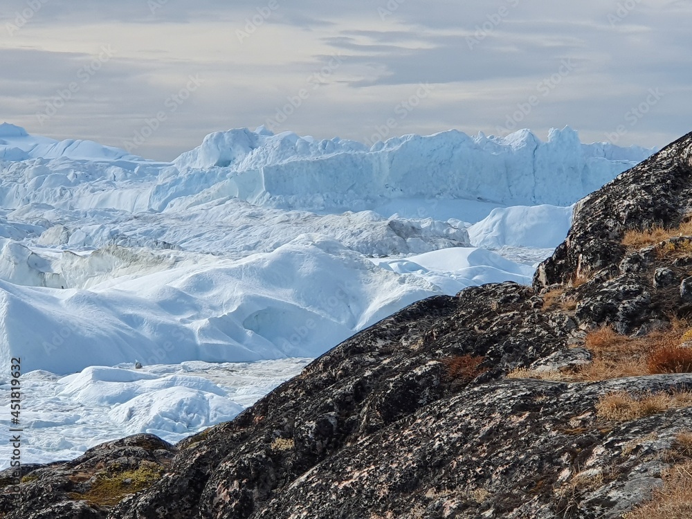 Breathtaking view of the vast nature of the Semeq Kujallek glacier near Sermermiut, Ilulissat, Greenland
