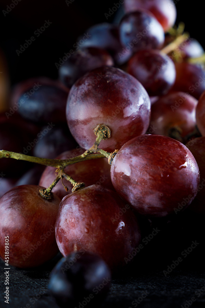 Fototapeta premium Close-up of organic red grape bunches