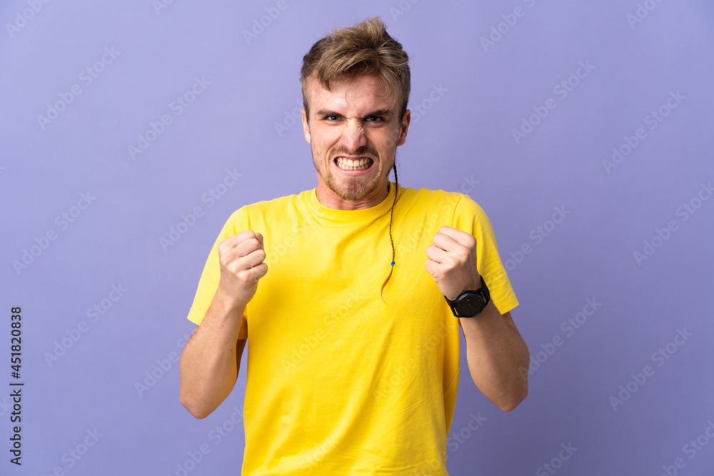 Young handsome blonde man isolated on purple background frustrated by a bad situation Young handsome blonde man isolated on purple background frustrated by a bad situation
