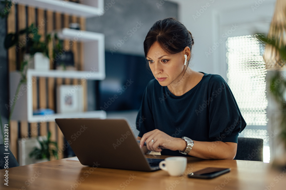 Beautiful woman working overtime at home. Beautiful woman working overtime at home.