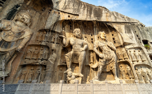 Longmen Grottoes with Buddha's figures are Starting with the Northern Wei Dynasty in 493 AD. It is one of the four notable grottoes in China.