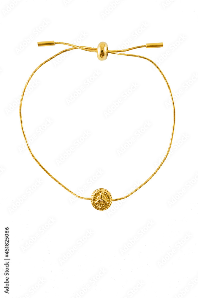 Golden bracelet with protection symbol isolated on a white background. Golden bracelet with protection symbol isolated on a white background.