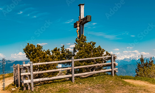 Beautiful alpine summer view with a religious cross at the famous Rossfeld panorama road near Berchtesgaden, Bavaria, Germany