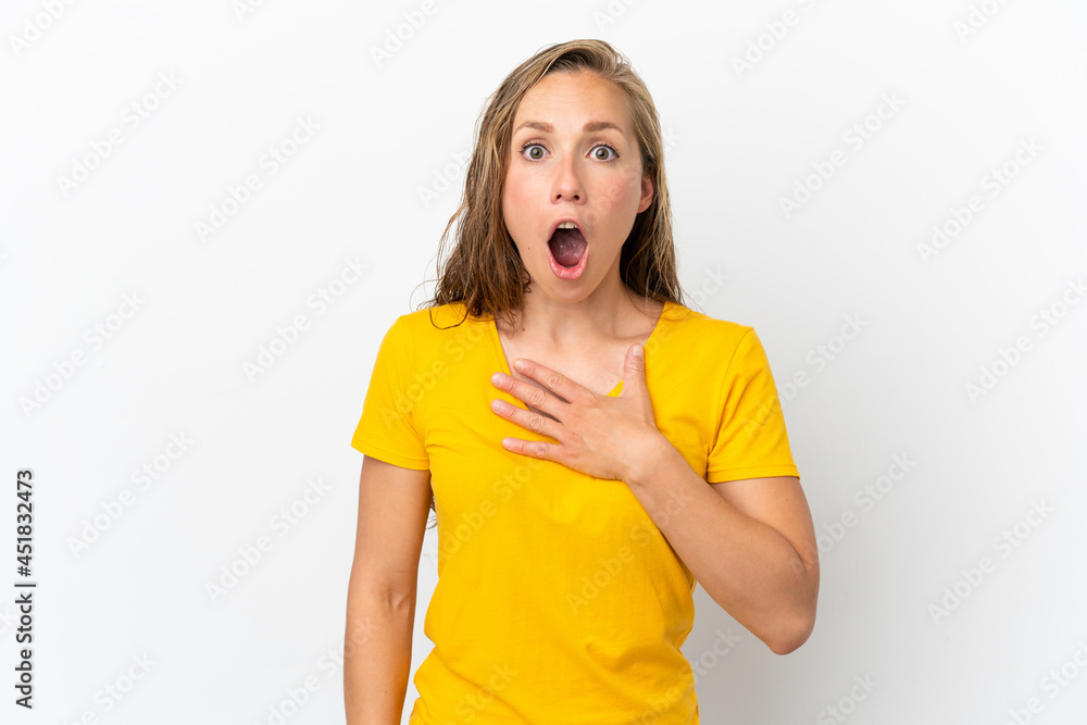 Young caucasian woman isolated on white background surprised and shocked while looking right Young caucasian woman isolated on white background surprised and shocked while looking right
