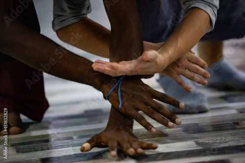 couple dancers contact hands in contact improvisation performance intentionally with motion blur ond defocus bokeh