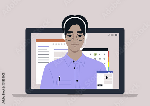 A young male Asian hotline assistant wearing a headset, online customer service info line