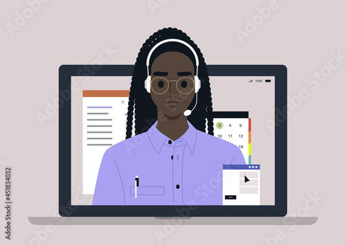 A young male Black hotline assistant wearing a headset, online customer service info line