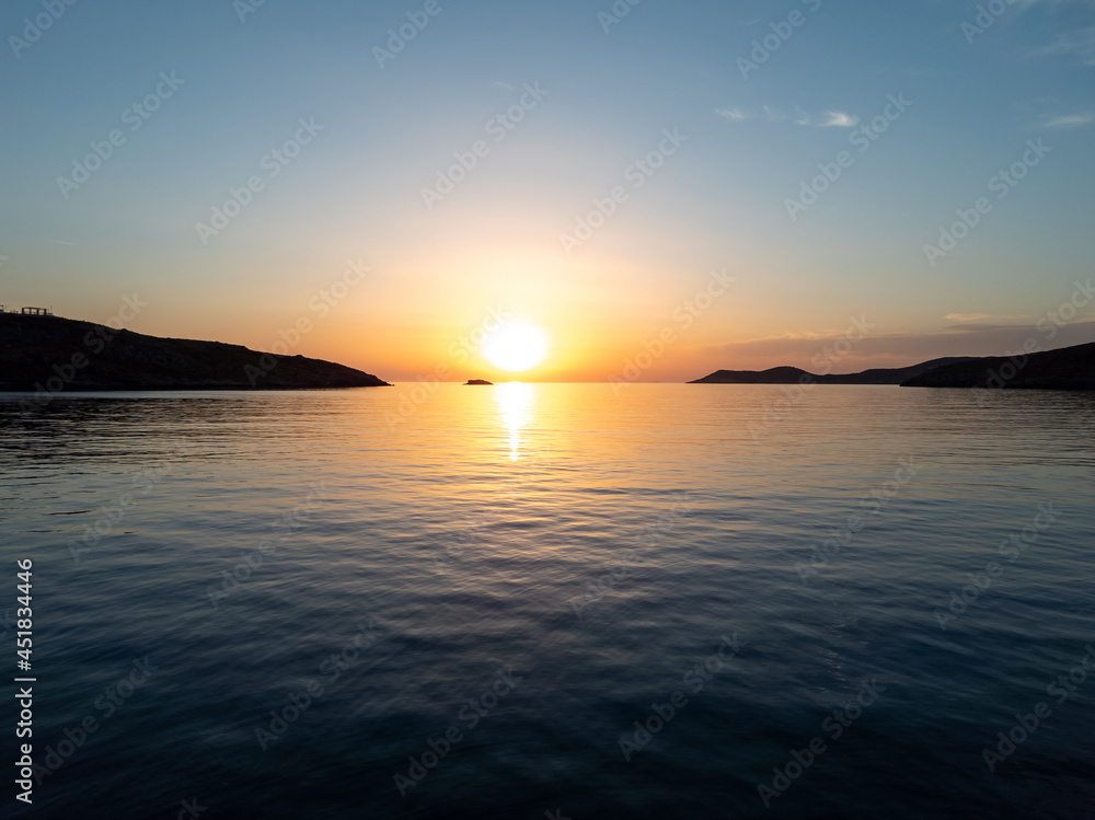 Sunset over kythnos island Merihas port Cyclades destination Greece.