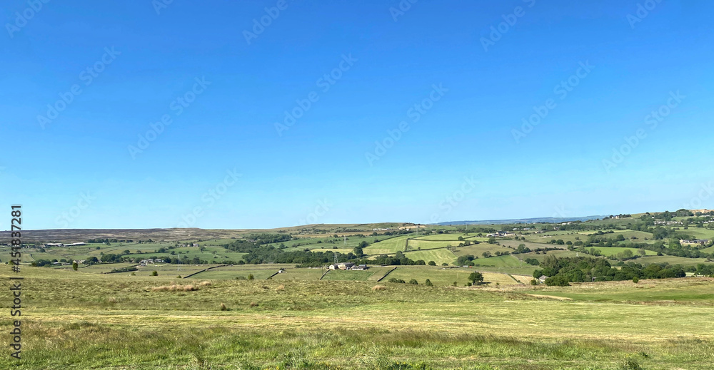 Landscape view from, Baildon Moor, set against a blue sky near, Baildon, Bradford, UK