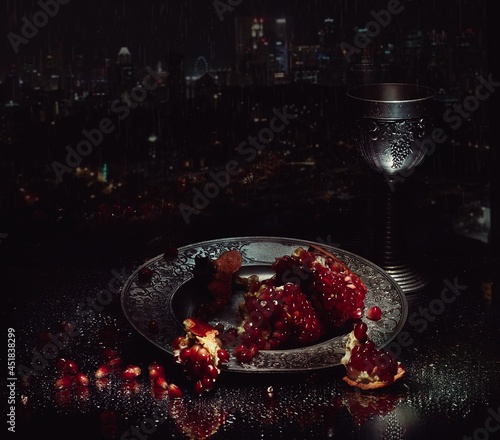 glass of red wine with pomegranate