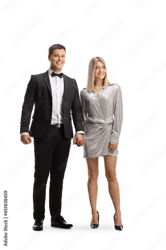 Full length portrait of an elegant young couple holding hands Full length portrait of an elegant young couple holding hands