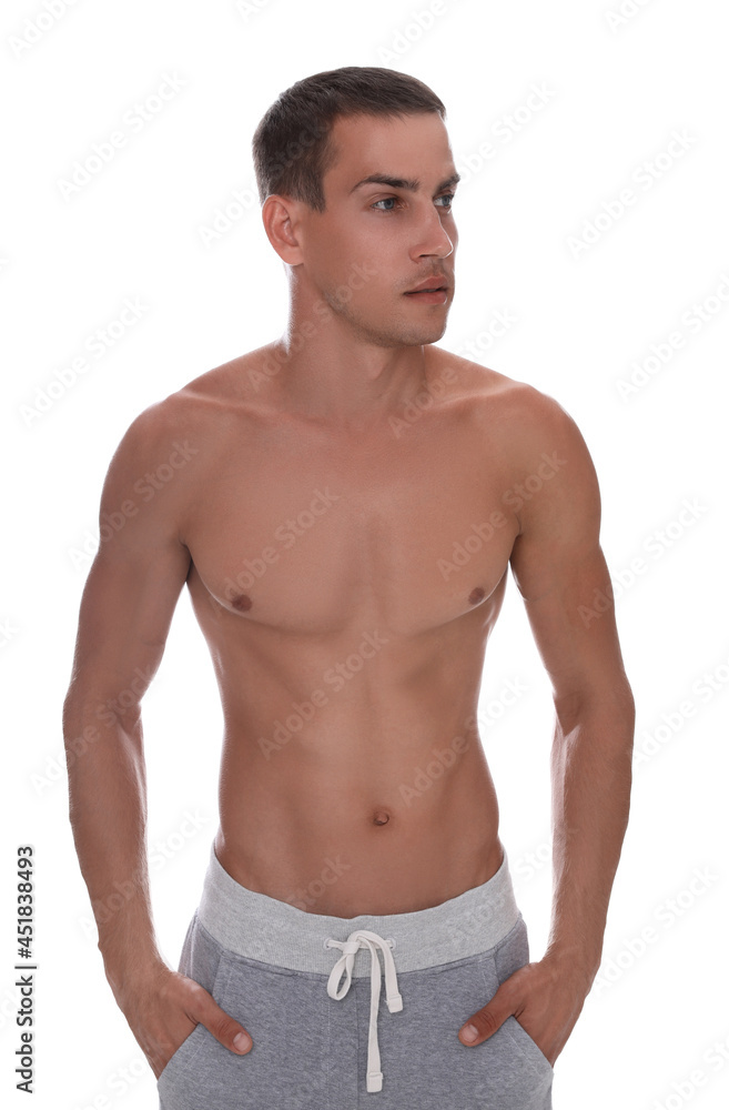 Handsome shirtless man with slim body isolated on white Handsome shirtless man with slim body isolated on white