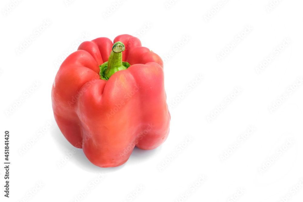 Big red pepper on white background