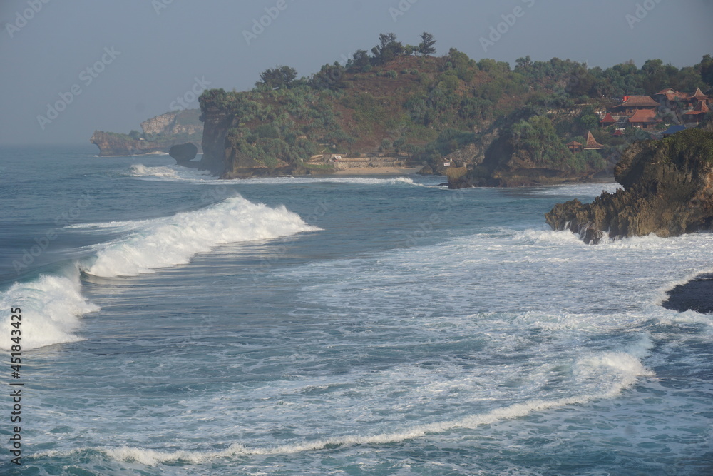 Mesra beach with a natural background. Mesra means intimate. Mesra beach also known as kukup beach or ngrawe beach