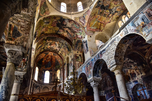 Mystras fortress and Byzantine city in Greece. Church interior and beautiful frescoes 