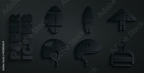 Set Bicycle helmet, Hang glider, Helmet, Ski lift, Surfboard and Rugby ball icon. Vector