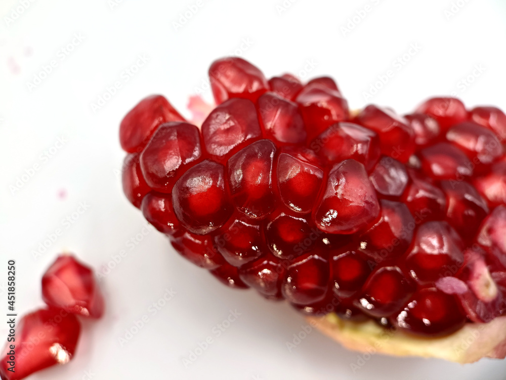 Fresh ripe pomegranate isolated on white background Fresh ripe pomegranate isolated on white background