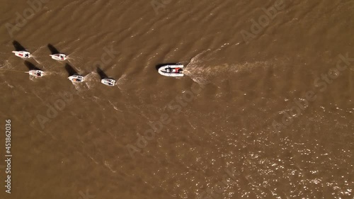 Aerial view of optimist boats, special boats for children. navigating the river. photo