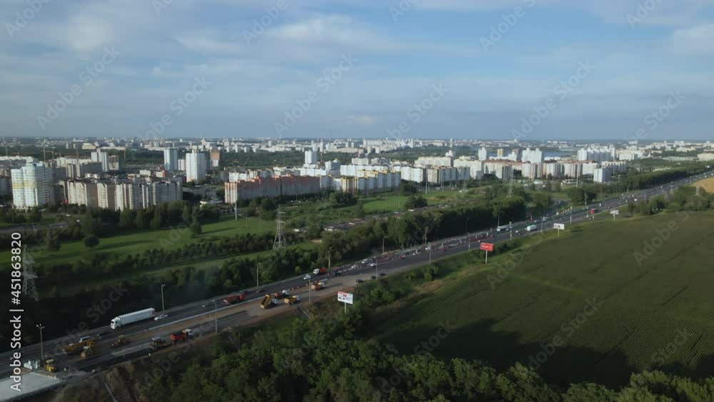 Agricultural fields on the outskirts of the city. Filmed at sunset. Aerial photography. Agricultural fields on the outskirts of the city. Filmed at sunset. Aerial photography.