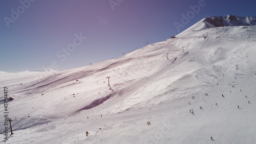 Slope of Erciyes Ski resort. Snow-covered ski slope in a bright winter morning. Kayseri, Turkey