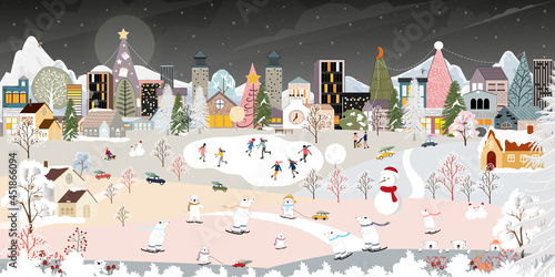 Winter wonderland landscape background at night with polar bear having fun in the city on new year,Christmas day in village with people celebration, kids playing ice skate, teenager skiing on mountain