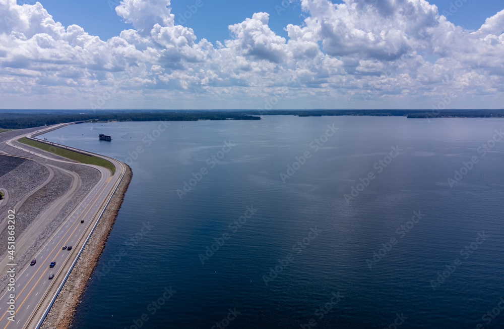 Scenic dam with a large lake.