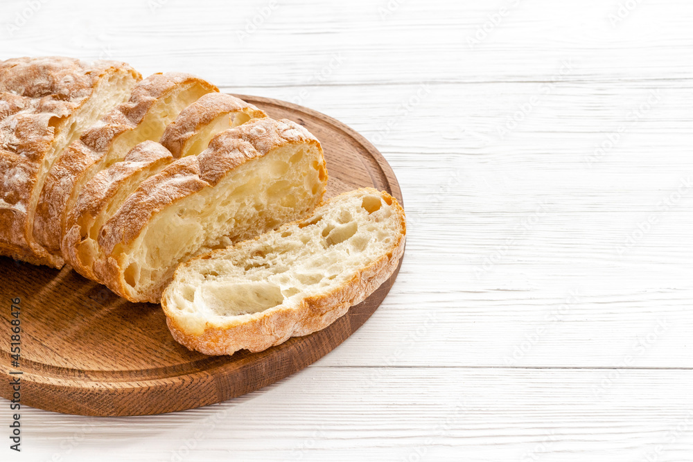 Close up of whole grain bread on cuttin board Close up of whole grain bread on cuttin board