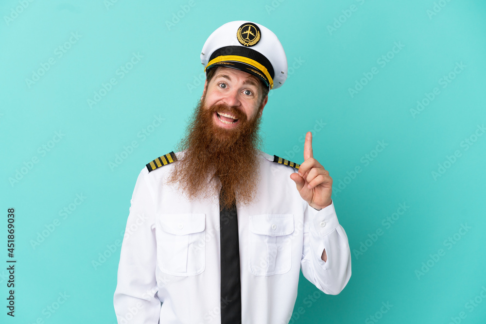 Redhead caucasian man playing rugby isolated on yellow background showing and lifting a finger in sign of the best Redhead caucasian man playing rugby isolated on yellow background showing and lifting a finger in sign of the best