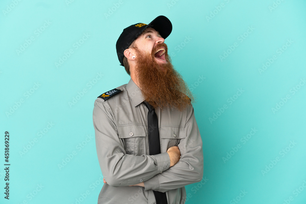 Redhead security man isolated on white background happy and smiling Redhead security man isolated on white background happy and smiling