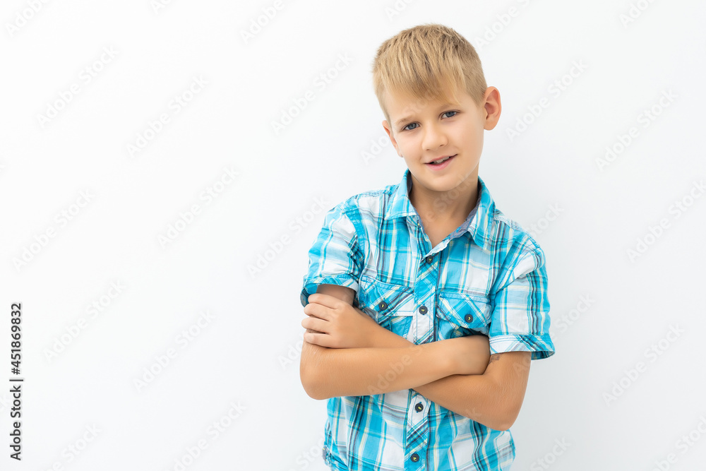Photo of adorable young happy boy looking at camera. Photo of adorable young happy boy looking at camera.