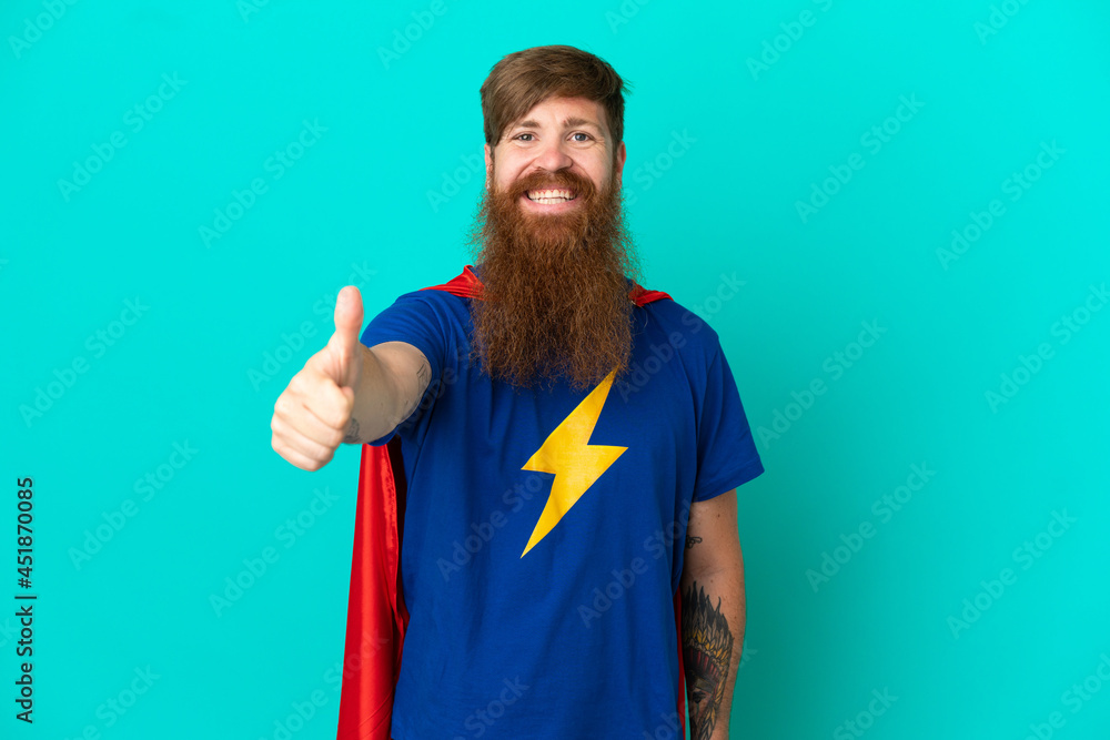 Redhead man in superhero costume with thumb up Redhead man in superhero costume with thumb up