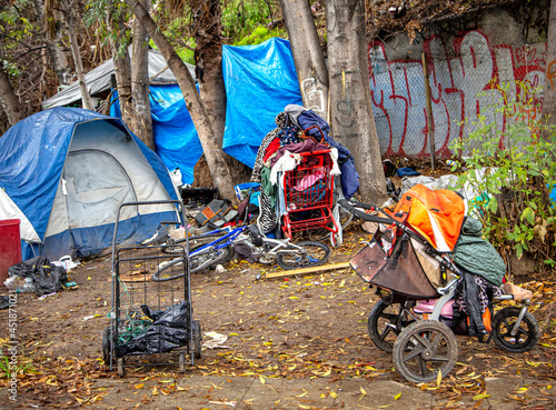 A homeless encampment on the side of a road