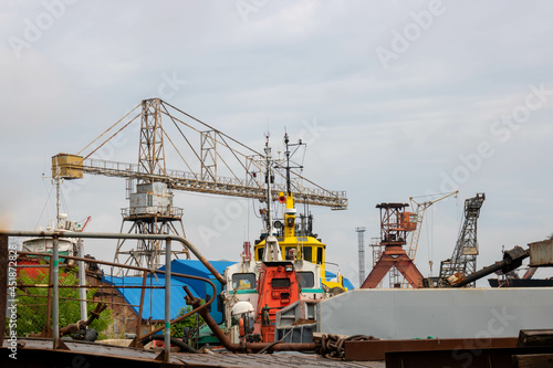 Wallpaper Mural Old rusty cranes and steamers in the port Torontodigital.ca