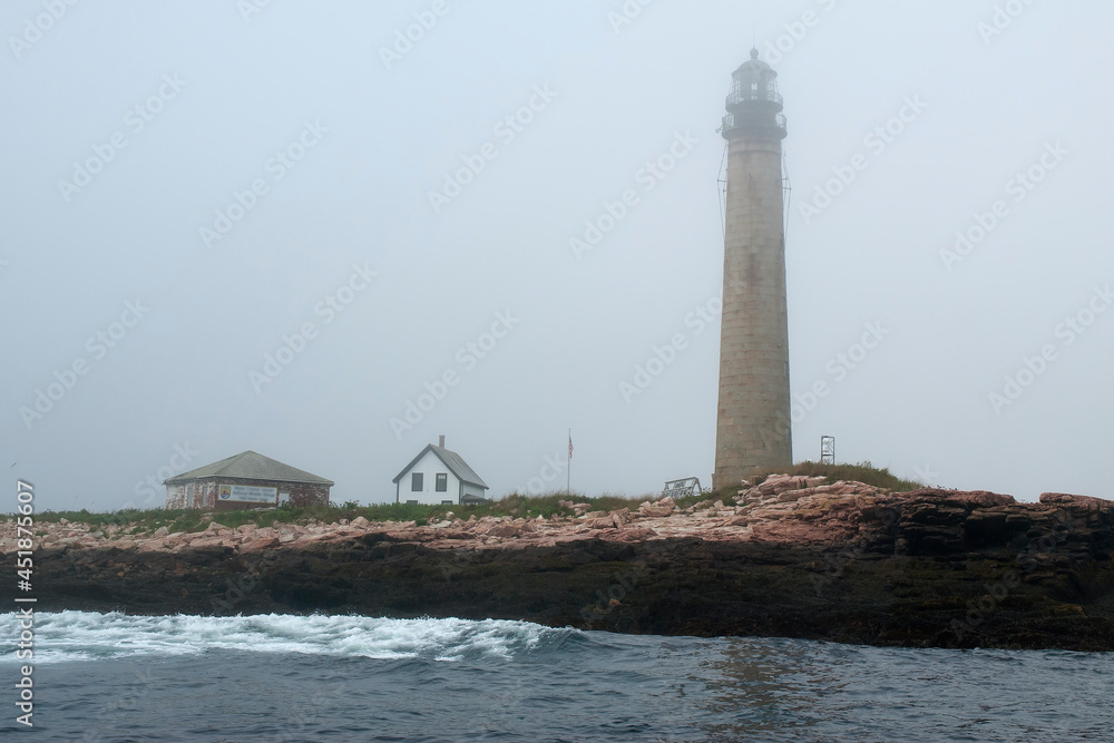 Tallest Lighthouse on Rocky Island in Fog in Maine