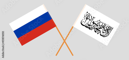 Crossed flags of Russia and Islamic Emirate of Afghanistan. Official colors. Correct proportion