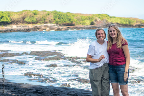 Two girls on the beach in hawaii © Allison