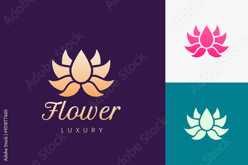 Luxury lotus flower logo in gold color for beauty spa or salon