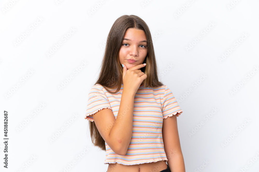 Little caucasian girl isolated on white background thinking Little caucasian girl isolated on white background thinking