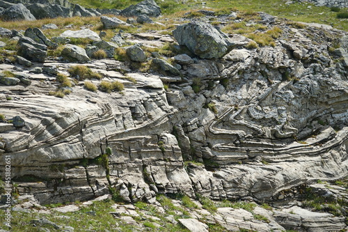 Characteristic appearance of a metamorphic rock derived from the exaggerated deformation of sandstone photo