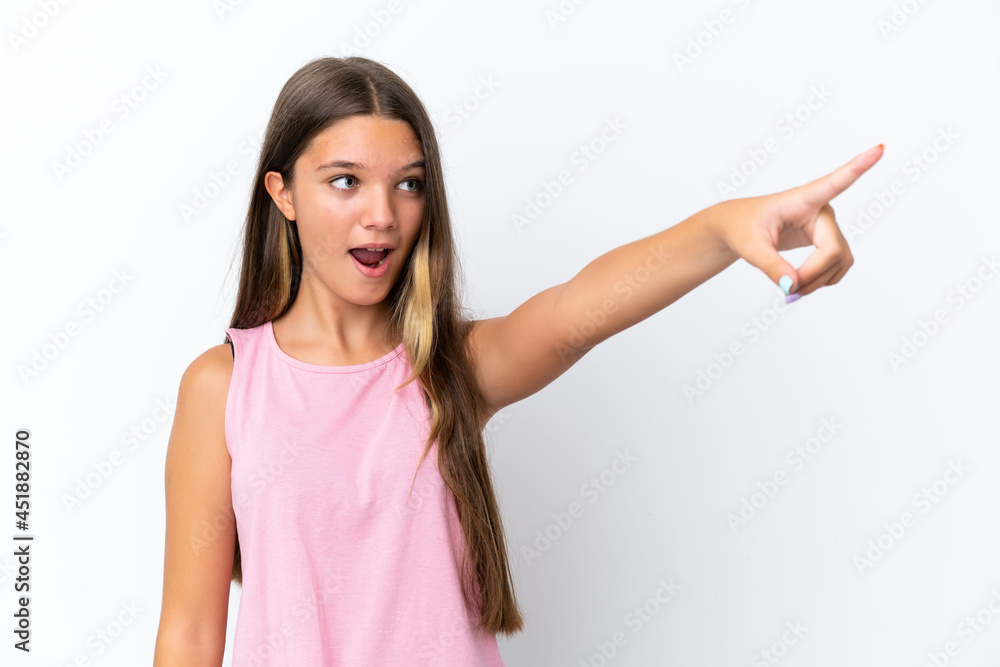 Little caucasian girl isolated on white background pointing away Little caucasian girl isolated on white background pointing away