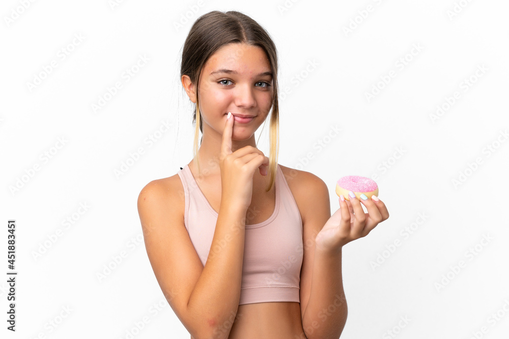 Little caucasian girl isolated on white background holding a donut Little caucasian girl isolated on white background holding a donut