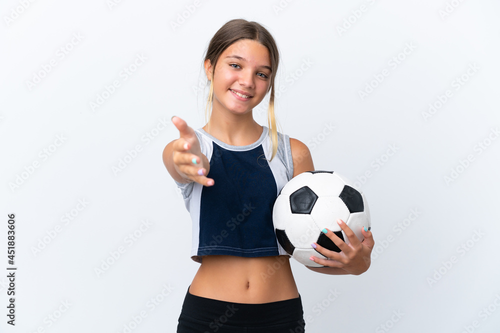 Little caucasian girl playing football isolated on white background shaking hands for closing a good deal