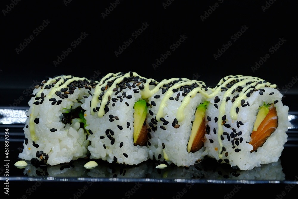 4 pieces of california rolls suhsi with black sesame and Japanese ...