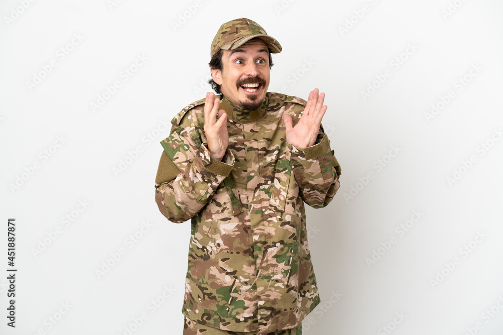 Soldier man isolated on white background with surprise facial expression