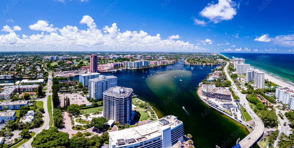 aerial drone panorama of lake Boca Raton, Florida with boats and city ...