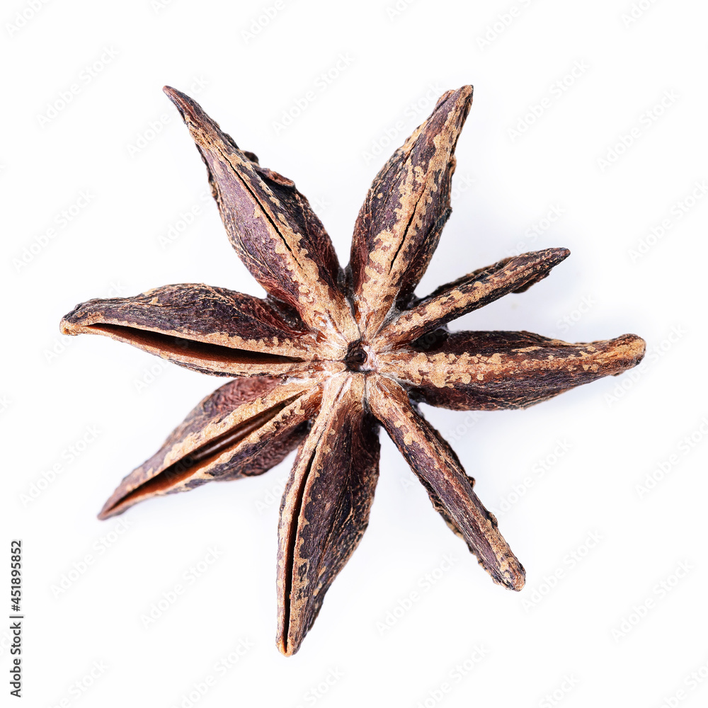 Single Chinese star anise isolated on white background. Single Chinese star anise isolated on white background.