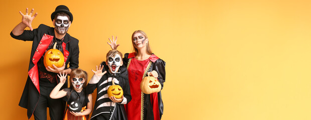 Family in Halloween costumes on color background with space for text