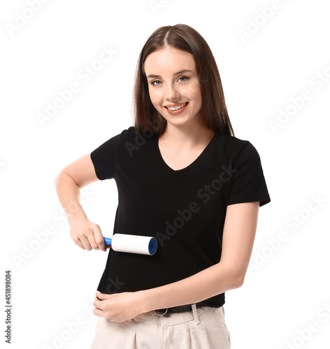 Young woman cleaning her t-...